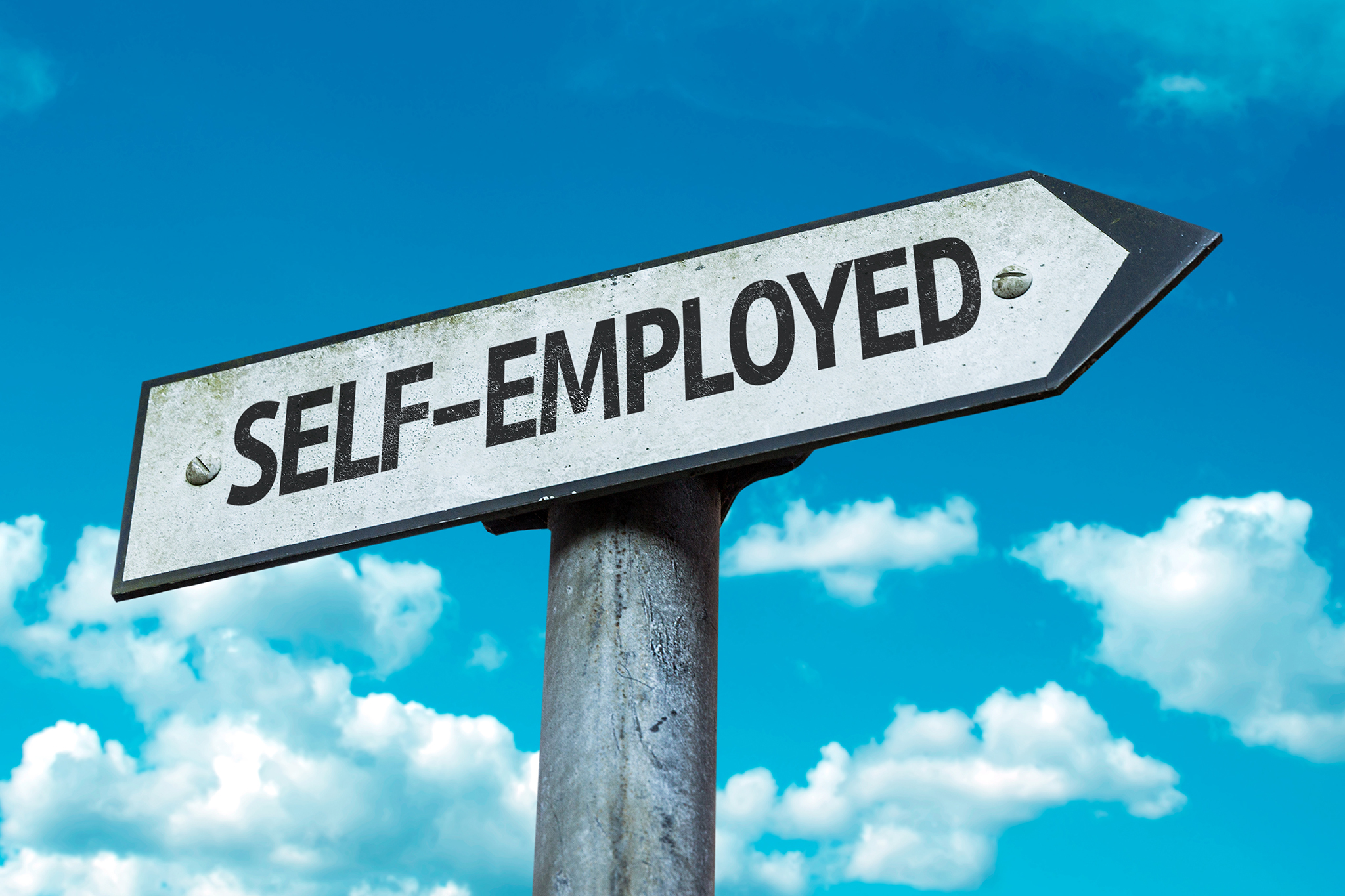 Self employed sign with sky background
